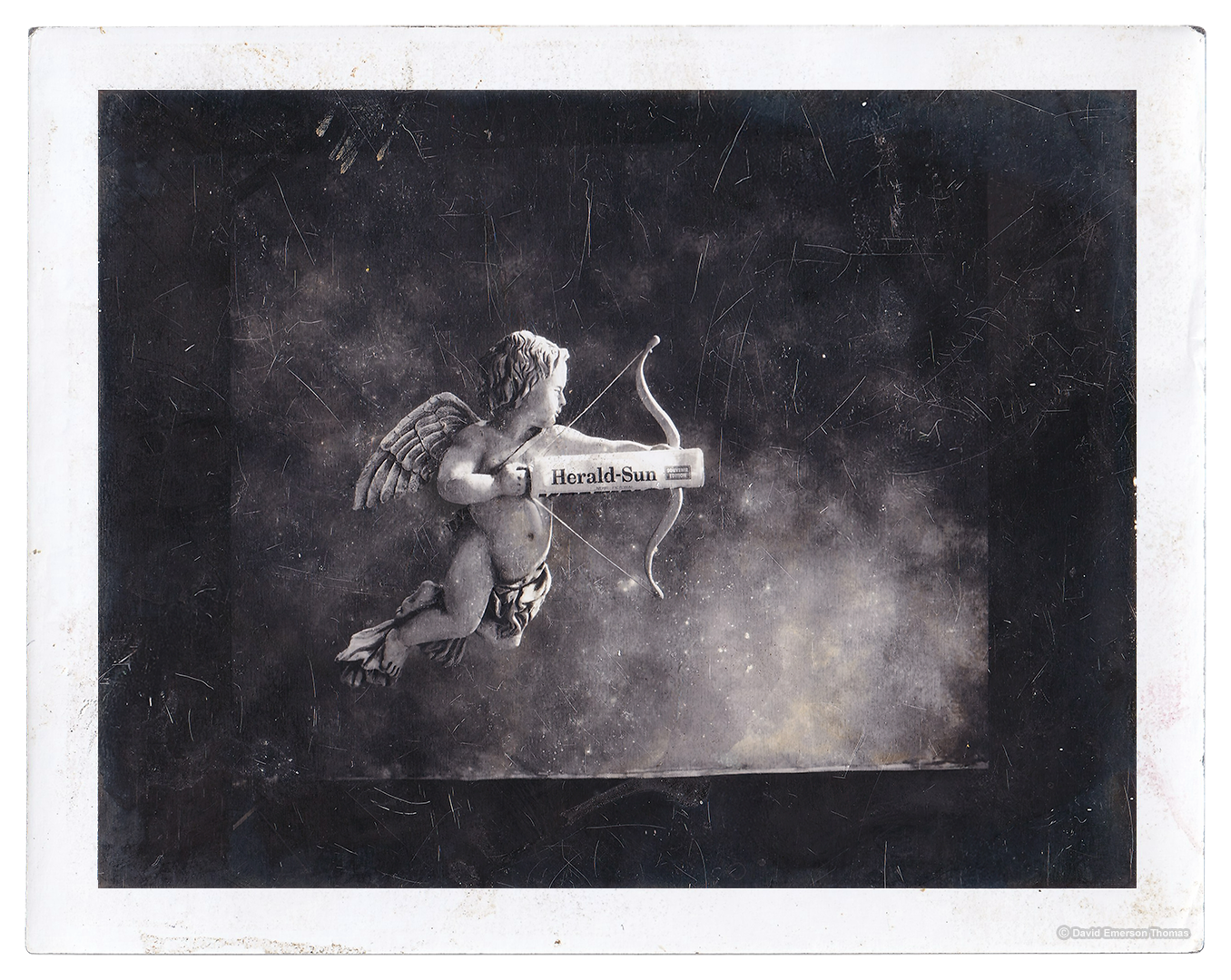 Sculpture of Cupid + Backdrop for the Cover Page of the Herald Sun Newspaper, Valentine’s Day Edition (Polaroid Test Shot) clay sculpture & plaster cast (aged for a weathered look) + painted texture backdrop by Australian artist David E Thomas, 1995. Heaven Pictures Studio - South Yarra, Victoria, Australia