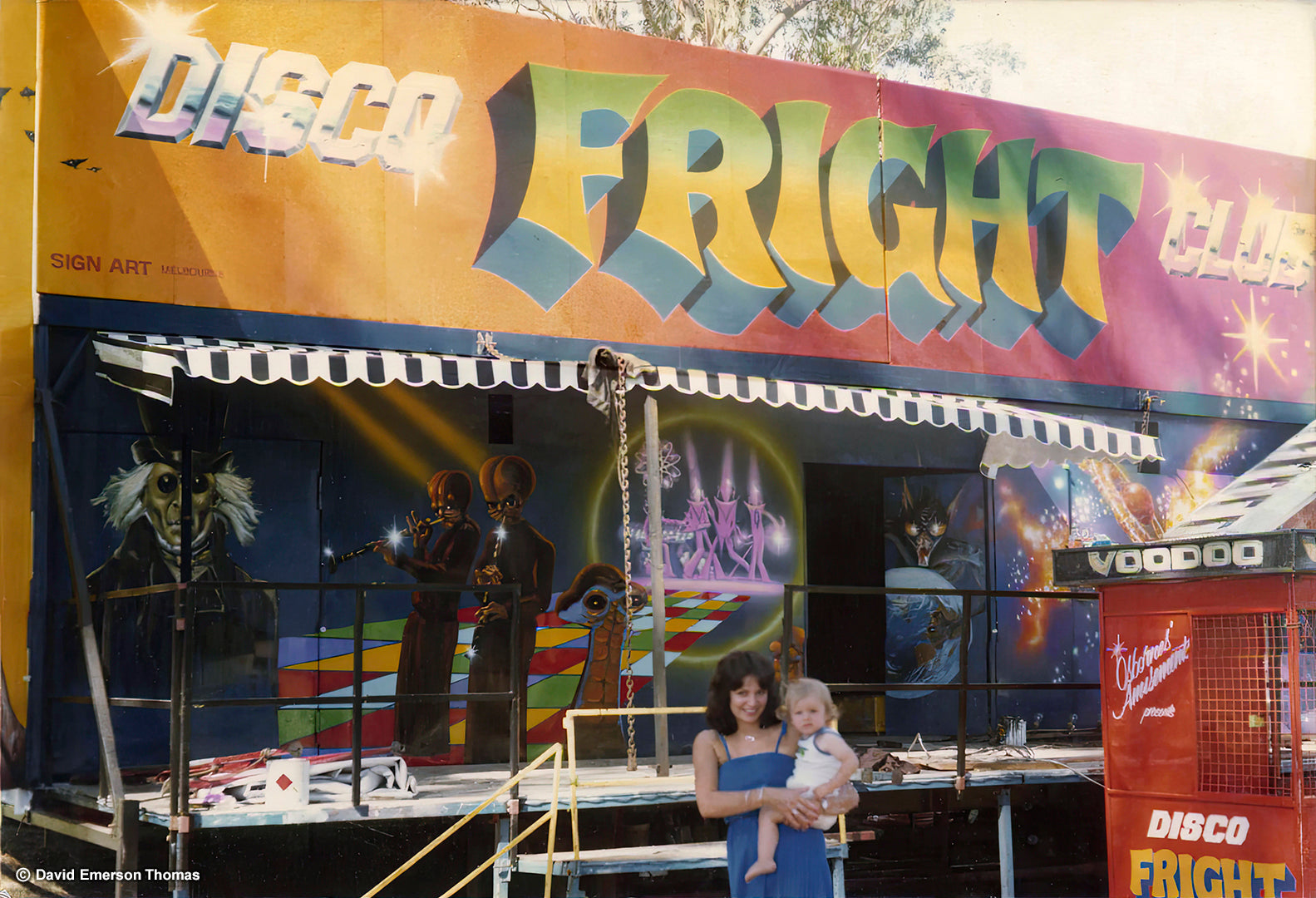 Carnival Ride Artwork with Various Sci-fi Film Characters (Featuring David's Wife, Glenda, & First Son, Mark) Photo 01 sign enamel by Australian artist David E Thomas, Artwork Created: 1977 & This Photo: 1979. Nowra, New South Wales, Australia