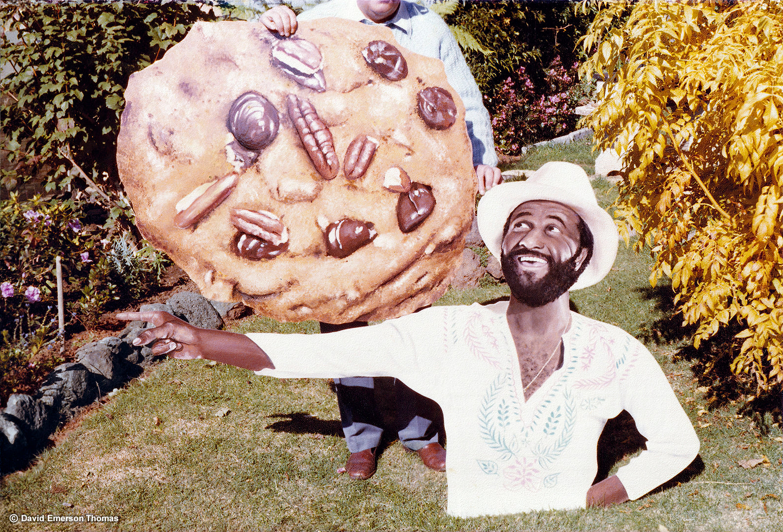 Cutout Artwork for Famous Amos Cookies Shop Front (Held by David's Father, Frank Thomas) sign enamel on marine plywood by Australian artist David E Thomas, 1980. David's Parents Backyard in Bayswater, Victoria, Australia