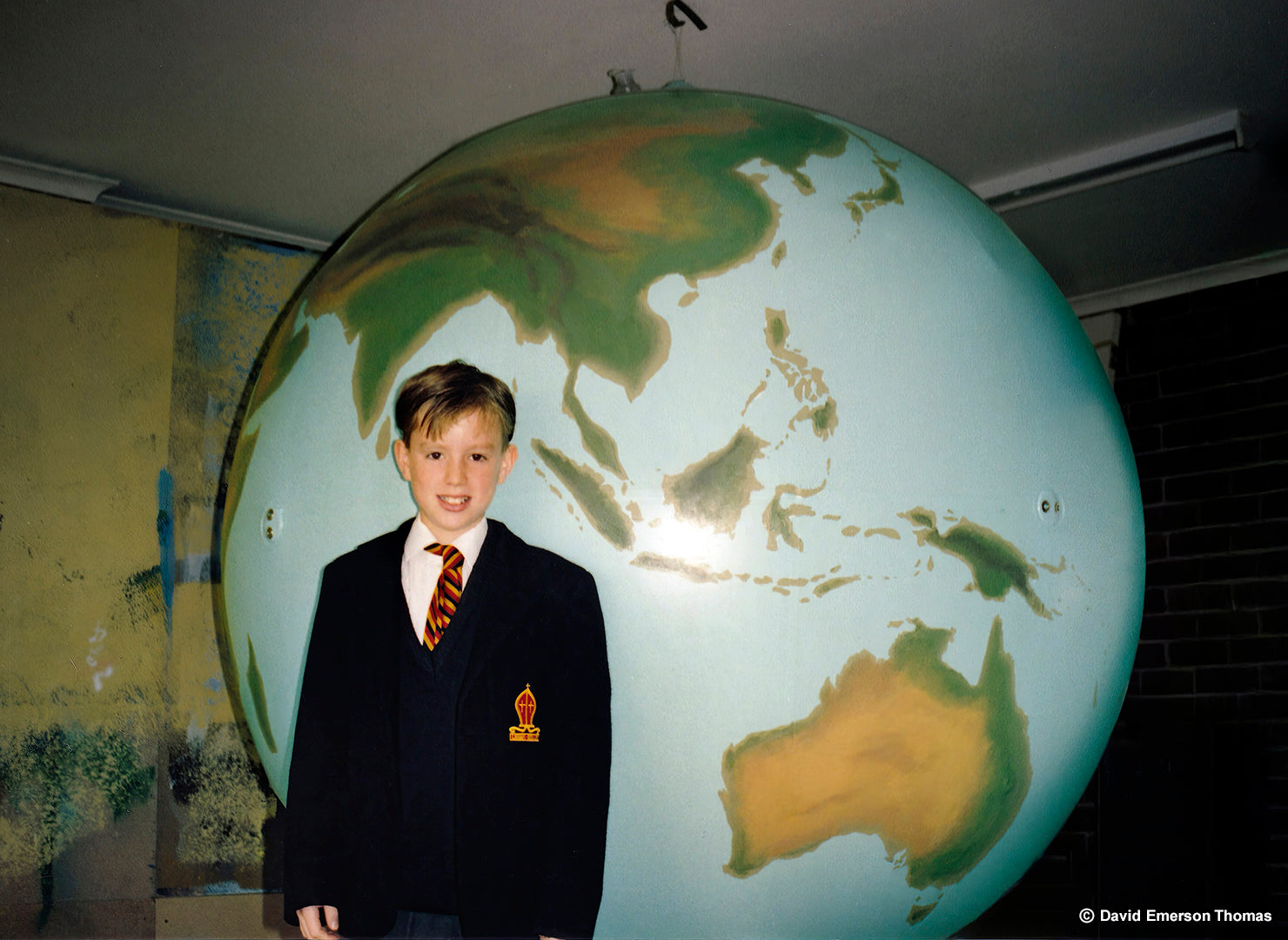 Painted Globe of Planet Earth (Featuring David's Second Son, Cameron) sign paint on pvc balloon by Australian artist David E Thomas, 1992. At Home in Warranwood, Victoria, Australia